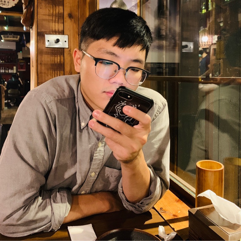 劉